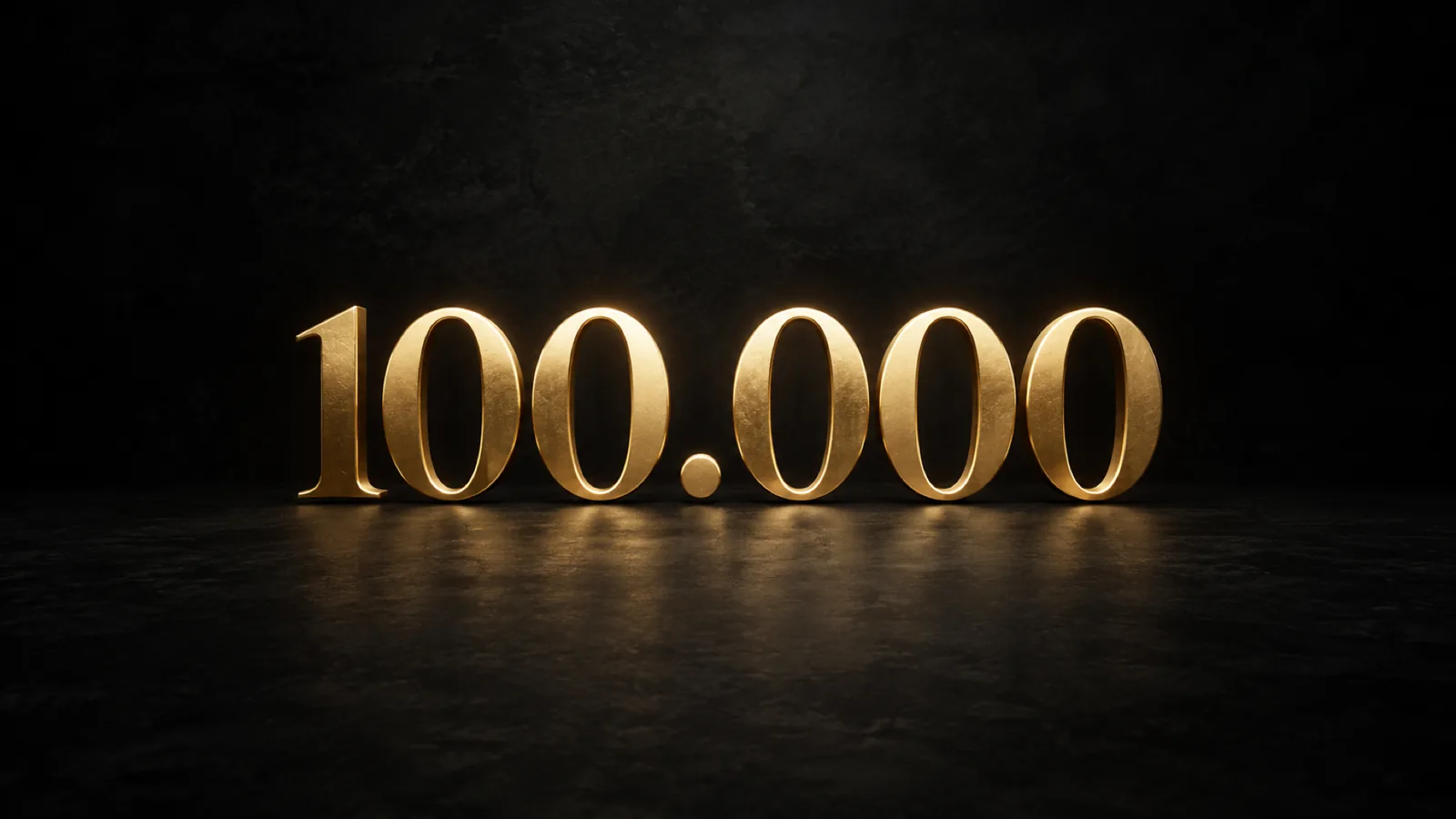 Il numero 100.000 in lettere dorate su fondo scuro